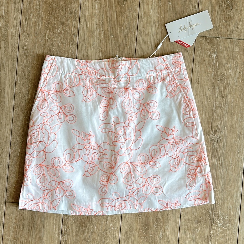 NWT Lady Hagen White and Neon Orange Golf Skorts Size 0